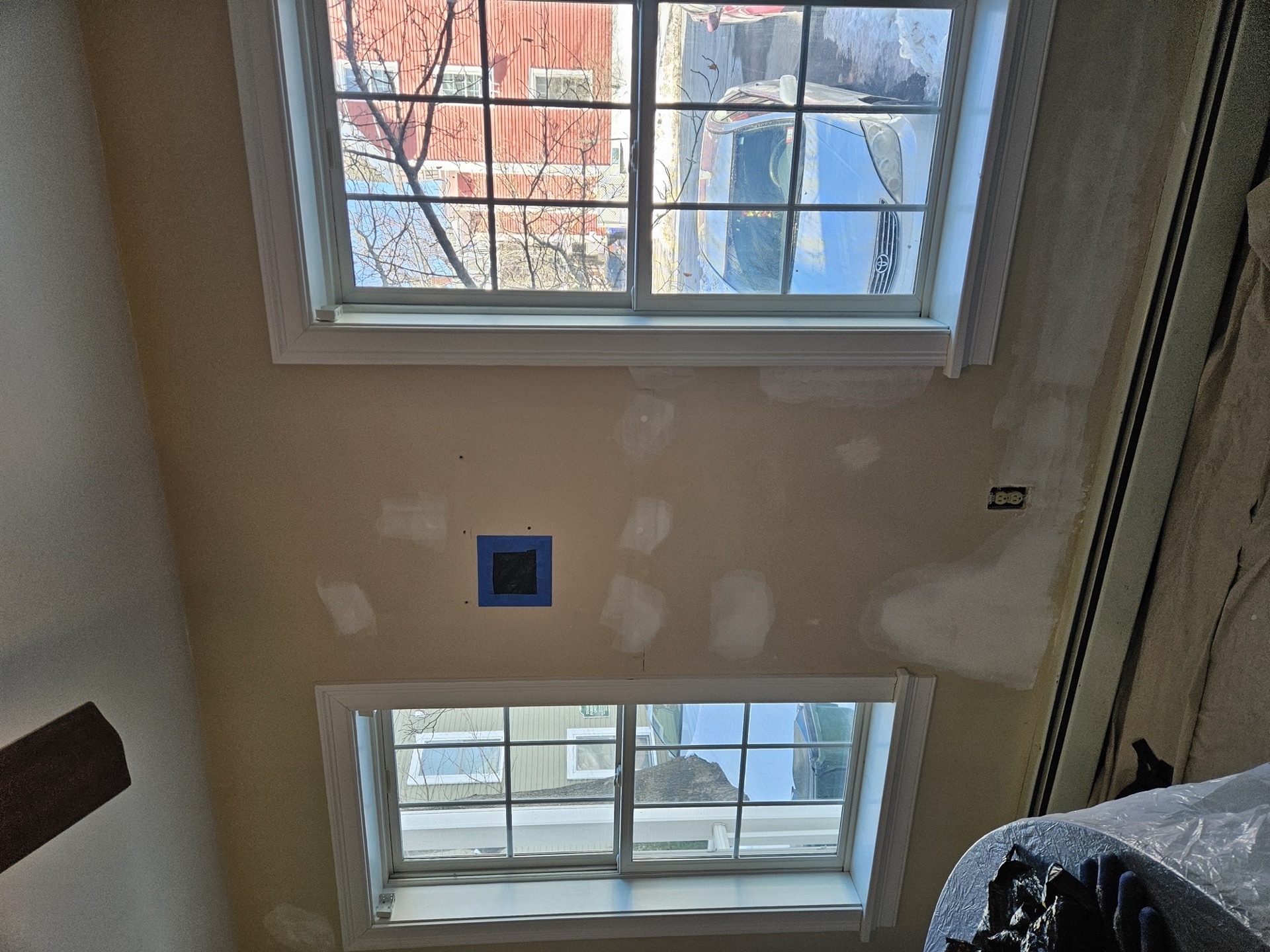 Drywall repair and patching before paint