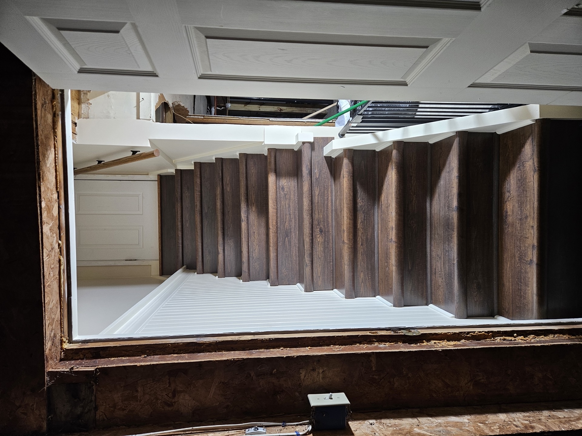 Refinished staircase with smooth stained treads