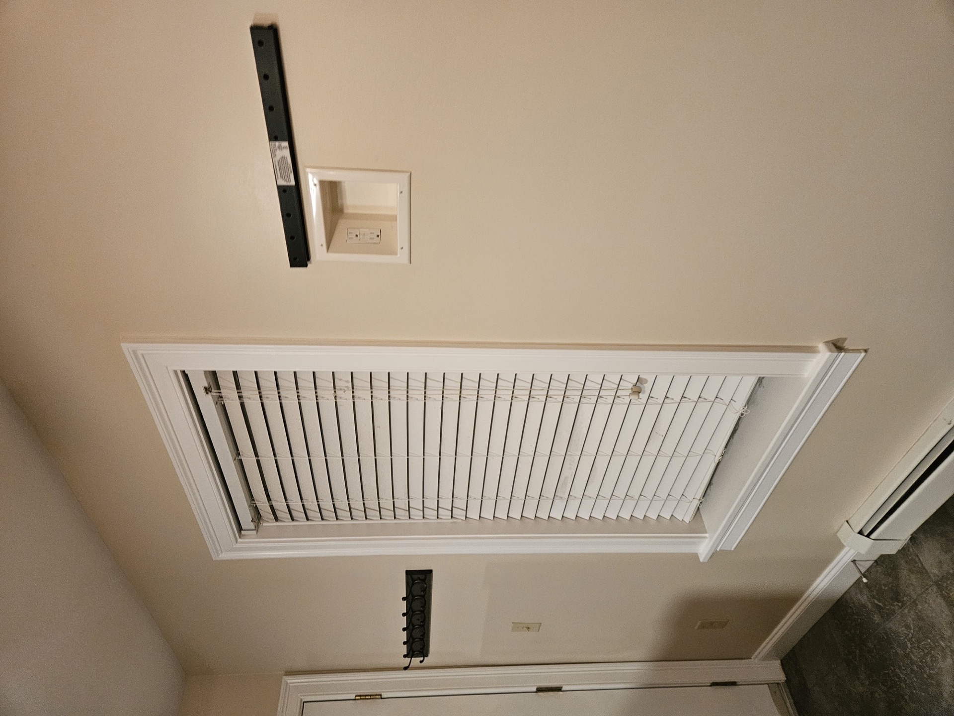 TV mount installation with hidden wiring