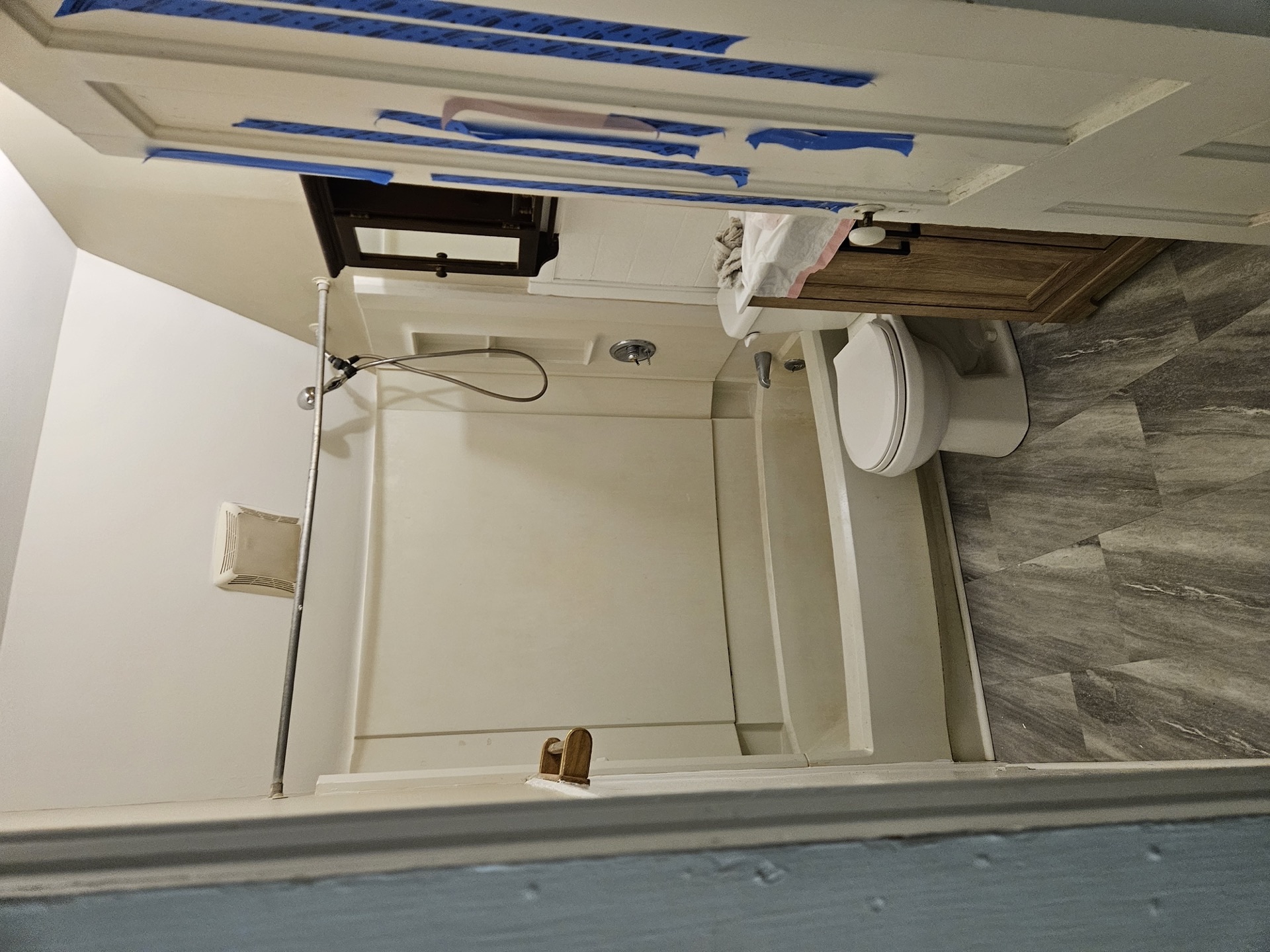 Bathroom wall after water damage restoration